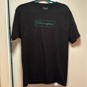 Men’s large champion shirt. Black with green logo